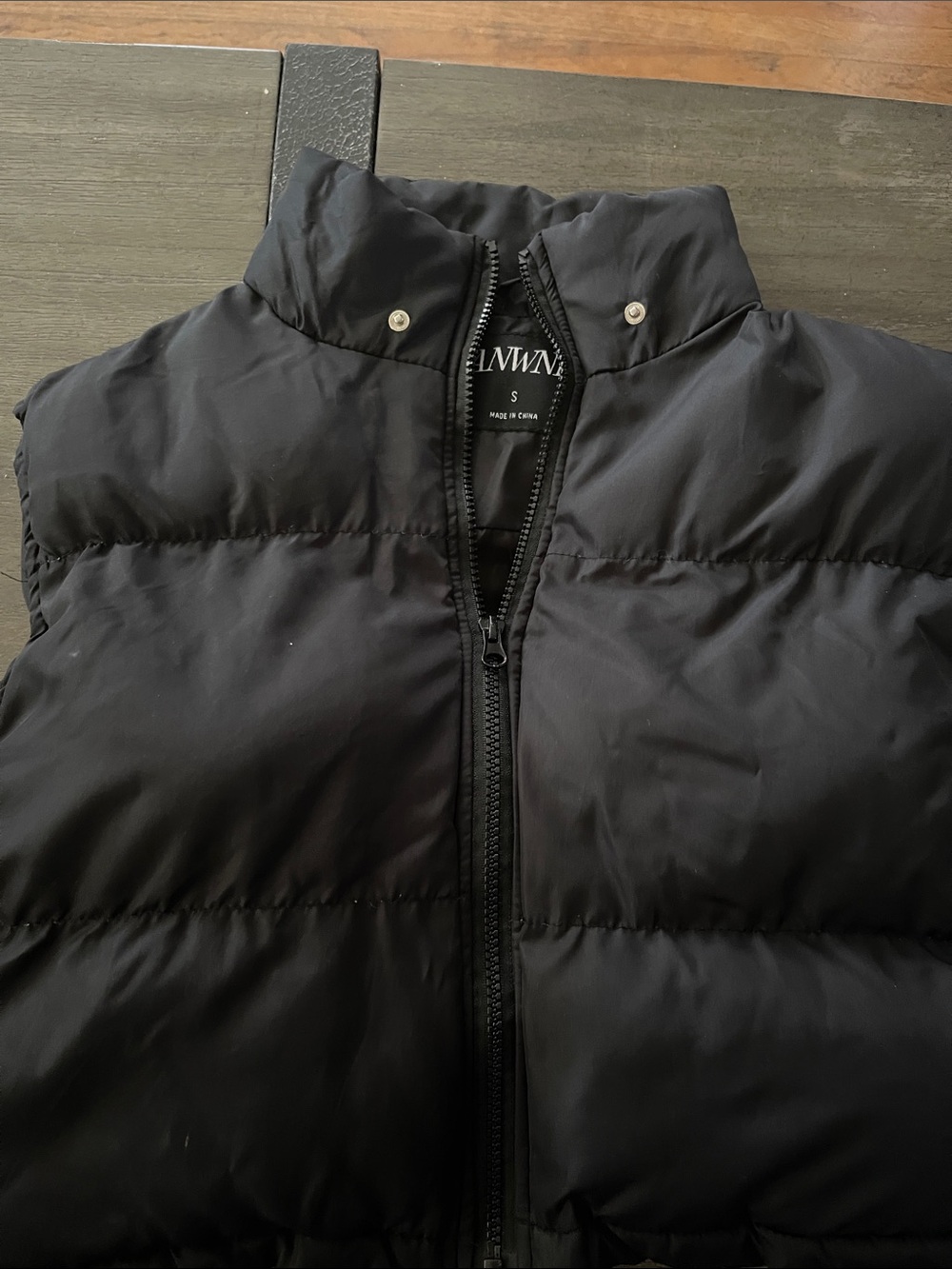 Black Puffer Vest with Stand Collar by ANWNT?
